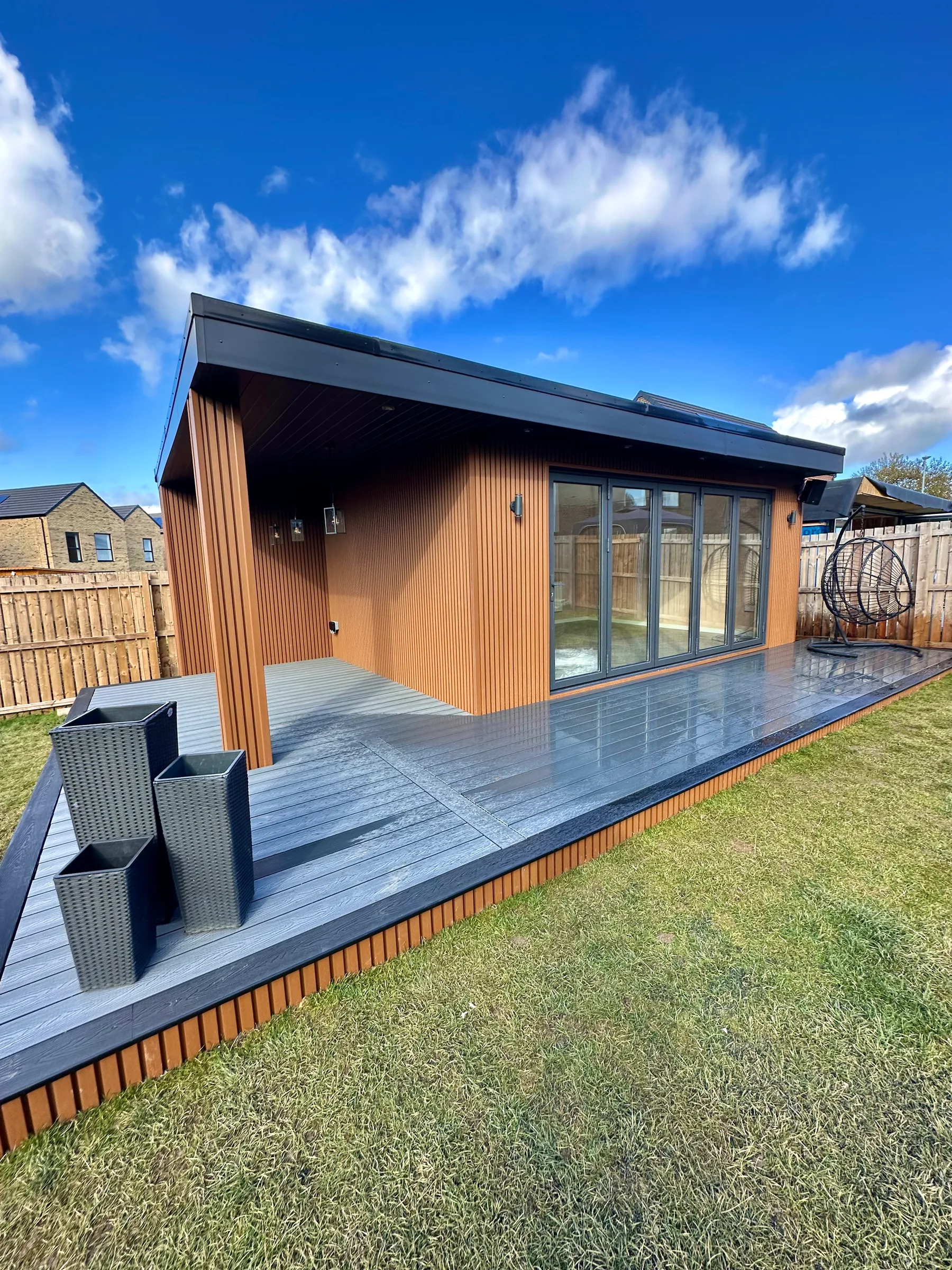 Yarm garden cinema and covered dining space by Goldridge Living